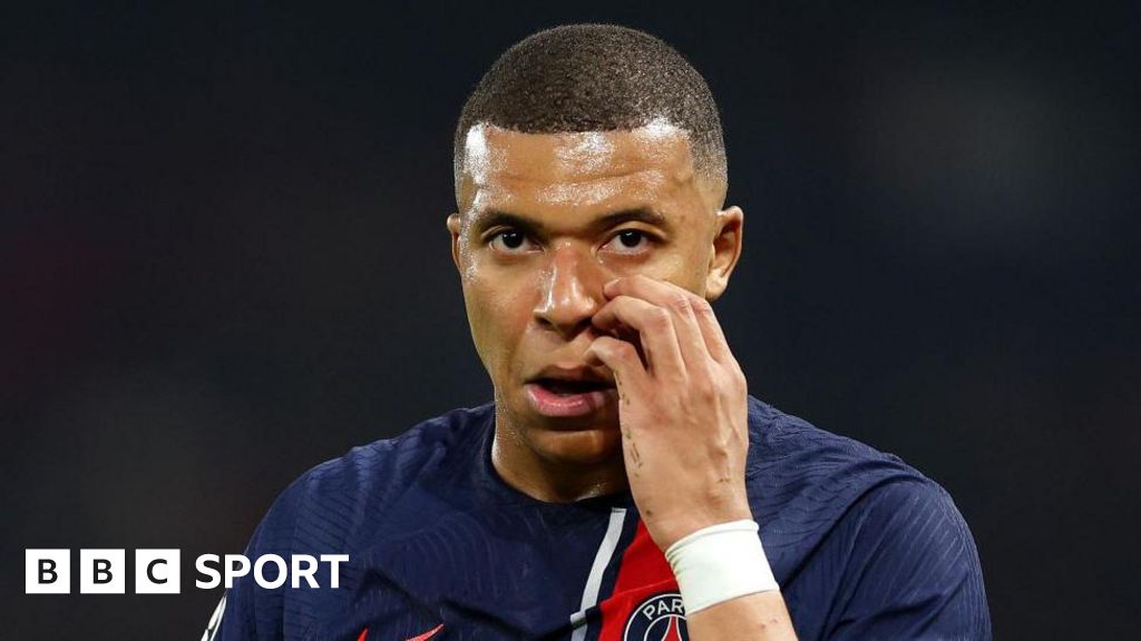 Paris St-Germain striker Kylian Mbappe looks emotional after their Champions League exit to Borussia Dortmund